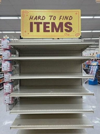 Photo of an empty store shelf labelled "hard to find items"