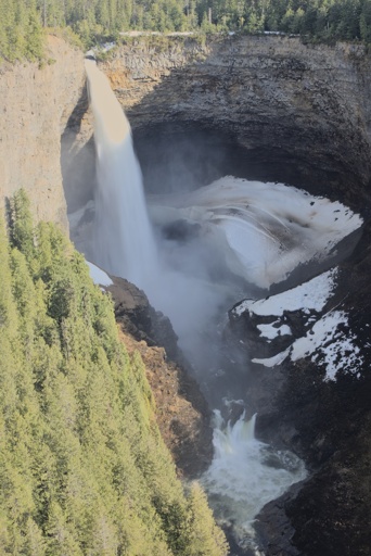 Helmcken falls with a secondary fall seen just downstream.  The large remnants of the ice cone may be seen stained by the runoff from the ledge above.